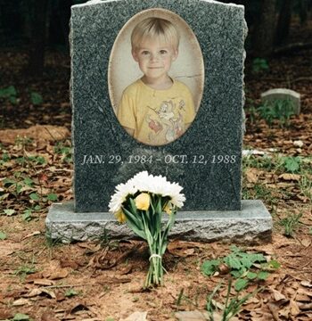 I discovered an old headstone deep in the woods — and froze when I saw my childhood photo engraved on it. The truth left me speechless.